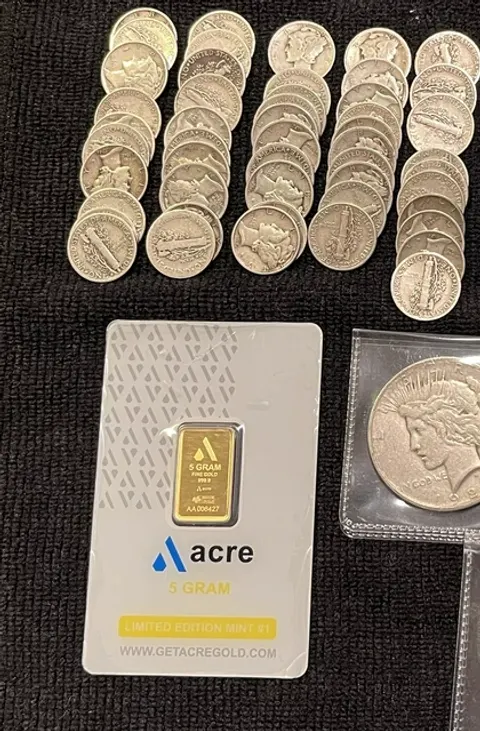 Gold bar and silver coins